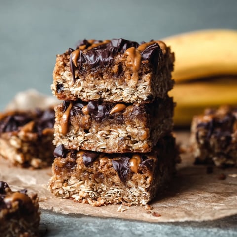 A stack of chocolate and peanut butter bars.
