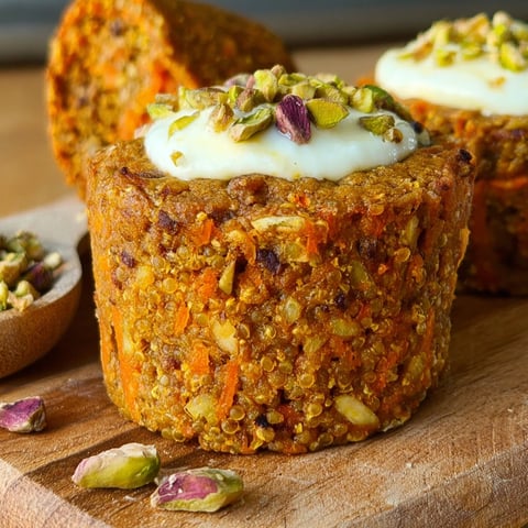 A muffin with a filling of cheesecake and carrots.