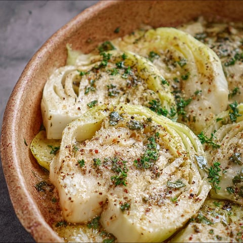 A bowl of food with a piece of food in it.
