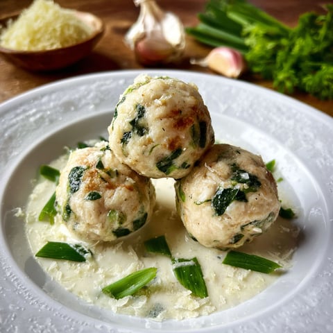 Three balls of food on a plate.